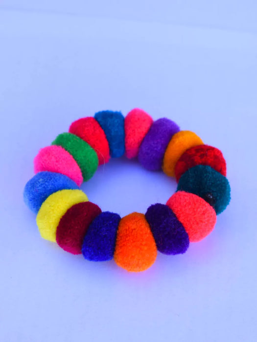 Multicolored Tulma Pom-Pom Hair Clip: Adorable Kids' Hair Accessory