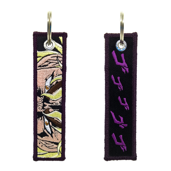 Dio Embroidered Keychain – Double-Sided JoJo’s Bizarre Adventure: Phantom Blood – Approx. 12x3 cm Anime Merchandise