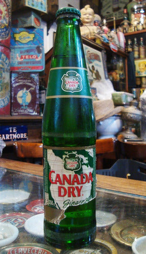 Antigua Botella De Gaseosa Canada Dry (llena). 25747 0