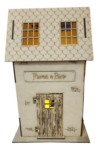 Flourish & Blotts Harry Potter House with LED Candle 9