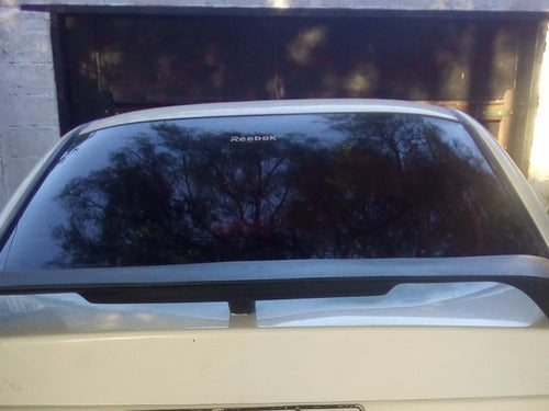 Mitsubishi Lancer 1999 Spoiler with Brake Light Installed and Painted 6