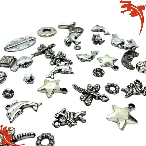 Gatuvia Silver and Old Gold Charms Cake 15 Souvenir Bijoux 25 Grams 1