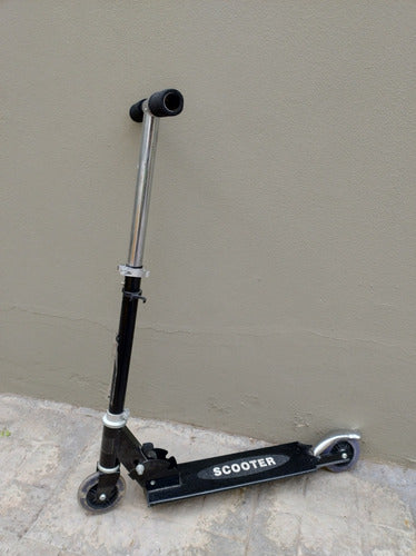 Monopatín Scooter 0