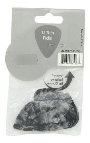 Fender Guitar Picks with Black Designs, Figures 1