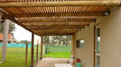 Rustic Wooden Pergolas, Galleries, Decked Decks, and Round Posts 0