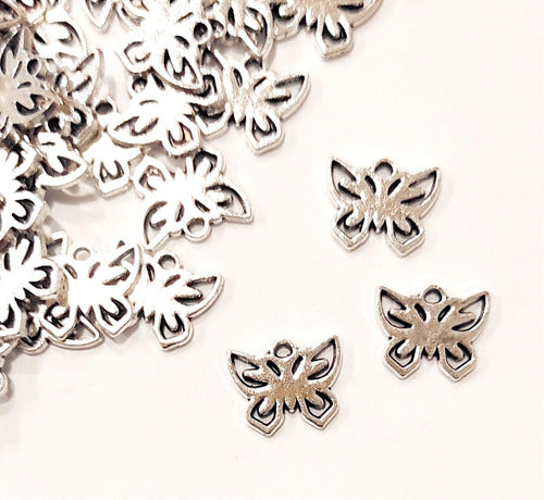 Tienda de Dijes 20 Butterfly Charms (4) Metal Jewelry Souvenirs 0