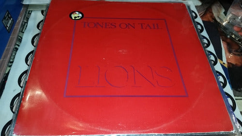 Tones On Tail Lions Go Vinilo Maxi Uk Muy Buen Estado 1984 0