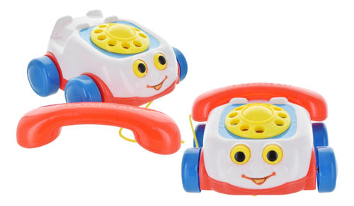 Toys Telefono De Juguete Con Carita Ruedas Y Sonido 0