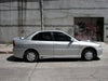 Mitsubishi Lancer 1999 Spoiler with Brake Light Installed and Painted 2