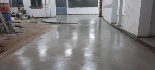Smooth Concrete Floors with Quartz Color Finish by Helicopter 0