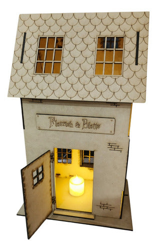 Flourish & Blotts Harry Potter House with LED Candle 5