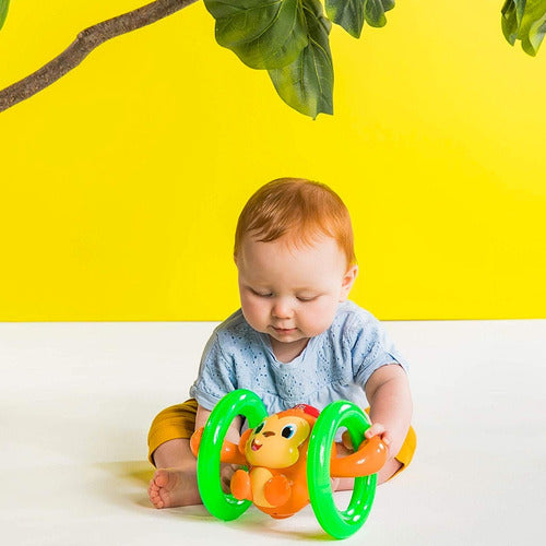 Bright Starts Early Stimulation Toy with Light, Sound, and Movement 4