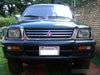 Mitsubishi Paragolpe Delantero (Central Part) L200 1997/2000 1