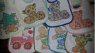 Wholesale Pack of Dozen Bibs with Prints 1