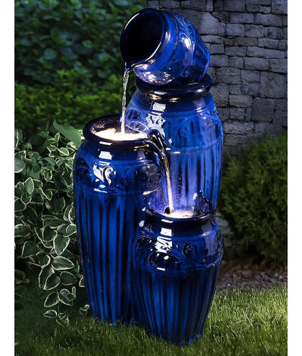 Glitzhome 27.25 H Garden Fountain with LED Lights and Pump, 4 Levels of Cobalt Blue Relief Pattern 0