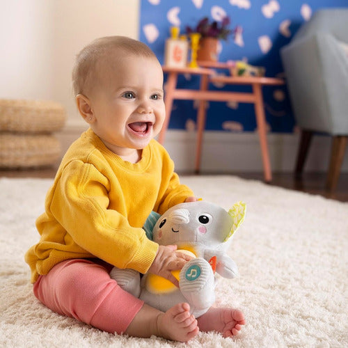 Bright Starts Interactive Baby Toy Elephant with Lights and Sounds 1