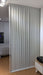 Customizable White Rotating Rods Room Divider 2